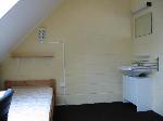 Cliquer ici pour agrandir la photo de la chambre 403 - le lit + l'vier